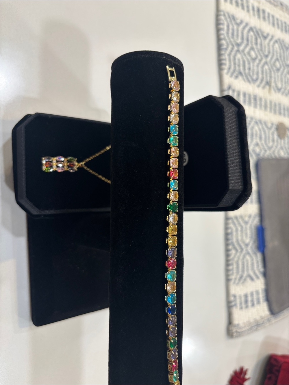 Gold tone, multicolored gem necklace, and tennis bracelet